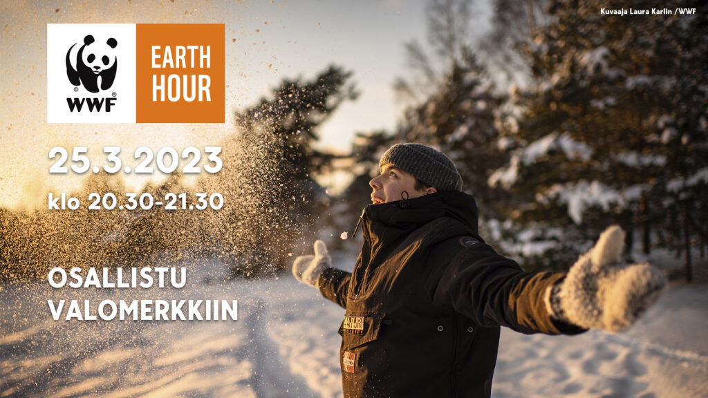 Earth Hour mainos, jossa henkilö heittää lunta